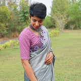 Grey tussar cutwork saree
