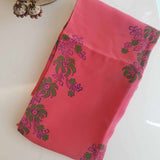 Neon pink Crepe silk fabric with green floral print