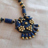 Blue and gold geometric designed handmade terracotta necklace with birds pendant