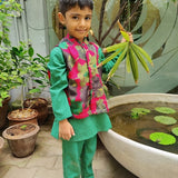 Pink printed satin coat with green kurta and pants