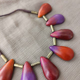 Red,orange,violet and magenta handmade terracotta necklace with leaf shaped design and earrings