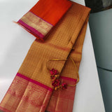 Sumangala - Golden mustard and rani pink handwoven Kanchipuram silk saree with zari checks and border