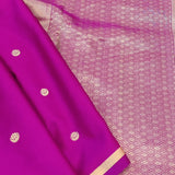 Magenta handwoven pure silk saree with small flower buttis in Benaras weave