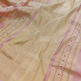 Light pink handwoven pure silk saree with all over floral pattern in Benaras weave