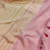 Light pink handwoven pure silk saree with all over floral pattern in Benaras weave