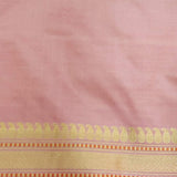 Light pink handwoven pure silk saree with all over floral pattern in Benaras weave