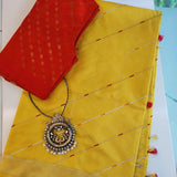 Yellow handwoven pure silk saree with geometric stripes in Benaras weave