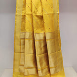 Yellow handwoven pure silk saree with geometric stripes in Benaras weave