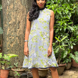 Apple green, cream and white floral on grey chiffon sleeveless dress with navy blue collar band