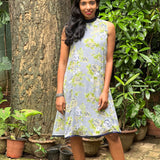 Apple green, cream and white floral on grey chiffon sleeveless dress with navy blue collar band