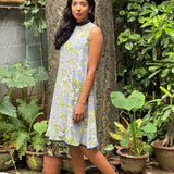 Apple green, cream and white floral on grey chiffon sleeveless dress with navy blue collar band