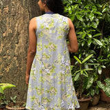 Apple green, cream and white floral on grey chiffon sleeveless dress with navy blue collar band