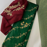 Bottle green kanchipuram silk saree with thodar butta