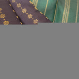 Meera - Black kanchipuram silk saree with dual colour pallu