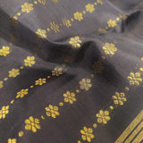 Meera - Black kanchipuram silk saree with dual colour pallu