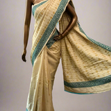 Tushara Beige yellow kutch embroidered tussar saree