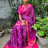 Mishrita Violet organza saree with pink kanchi silk border