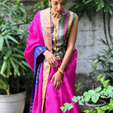 Mishrita Pink organza saree with navy silk border