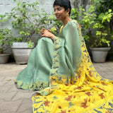 Jhalar Russian green yellow organza cutwork saree