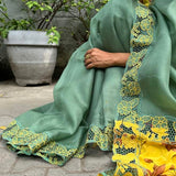 Jhalar Russian green yellow organza cutwork saree