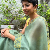 Jhalar Russian green yellow organza cutwork saree