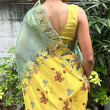 Jhalar Russian green yellow organza cutwork saree