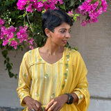 Yellow embroidered linen set