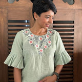 Green embroidered linen top