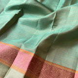 Kimaya teal silk saree