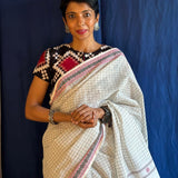 Iniya white checked kanchi cotton saree