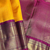 Sumangala yellow aubergine kanchi silk saree