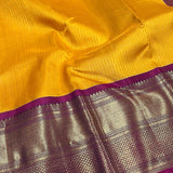 Sumangala yellow aubergine kanchi silk saree