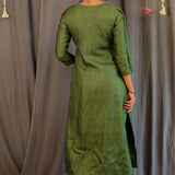 Emerald green embroidered silk pants