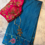 Silk ikat pettipoint embroidered saree