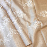 Beige and white embroidered tussar saree