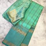 Kimaya long border checked silk saree