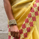 Tuhina Yellow Kutch Embroidery Organza Saree