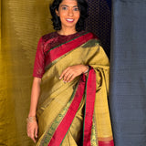 Haathee Crossing Offset Border Kanchi Silk Saree - Olive