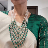 Silver necklace with pearl and emerald