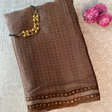 Metallic zari striped organza saree