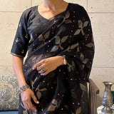 Sequinned floral matka organza saree