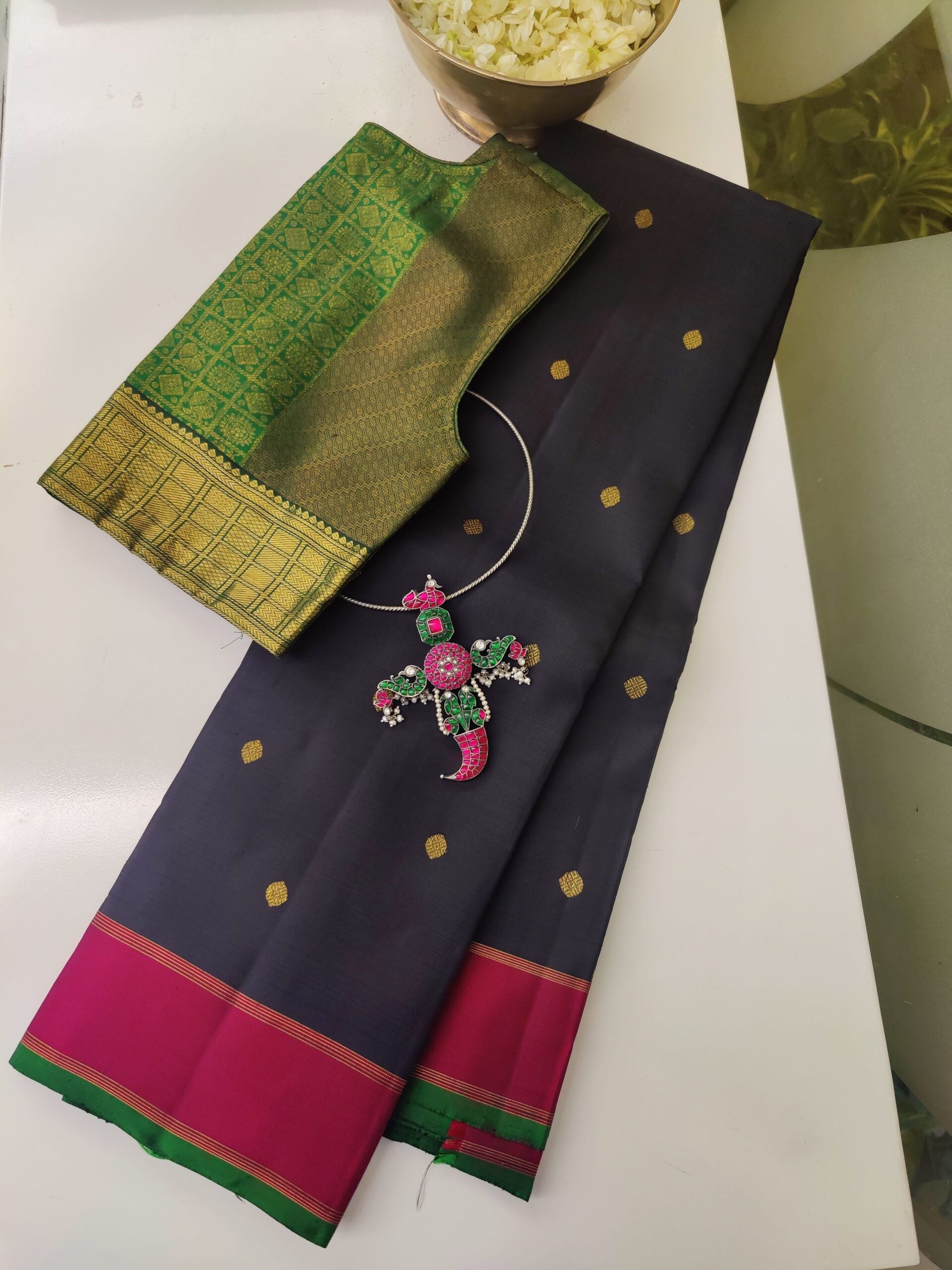 Black-pink-and-green-handwoven-Kanchipuram-silk-saree-with-small-diamond-buttis-1-rotated-1.jpg