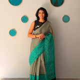 Tuhina Stripes Print Play Organza Saree - Turquoise