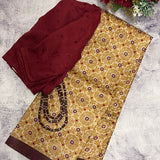 Veena tile print tussar saree