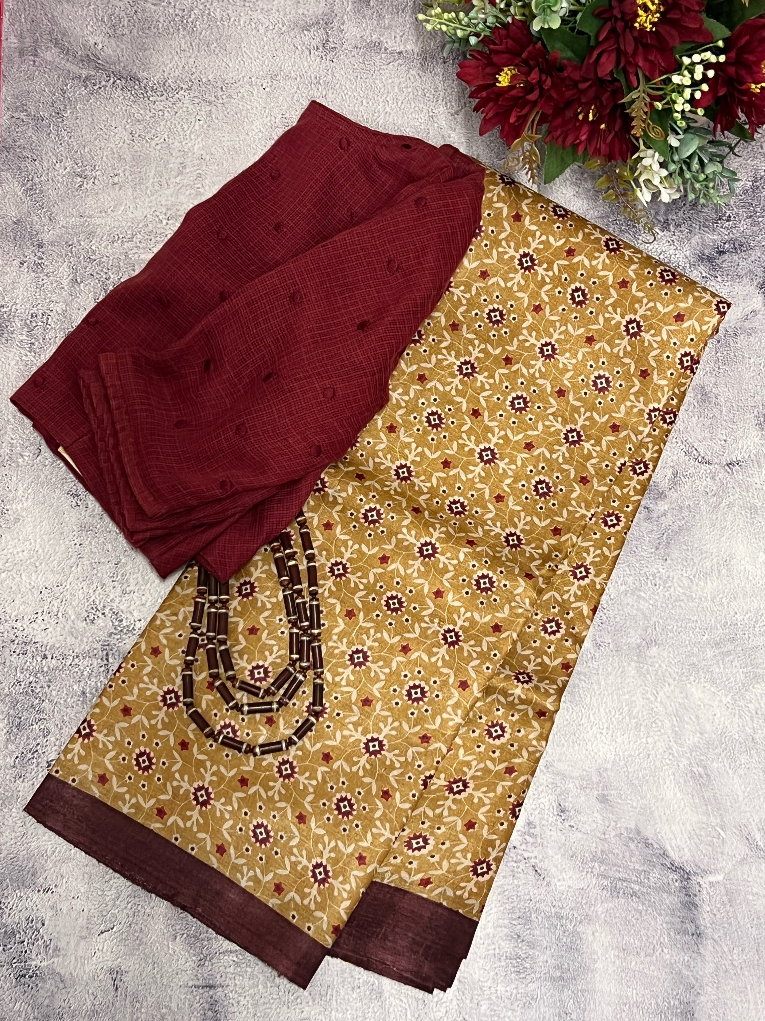 Veena tile print tussar saree