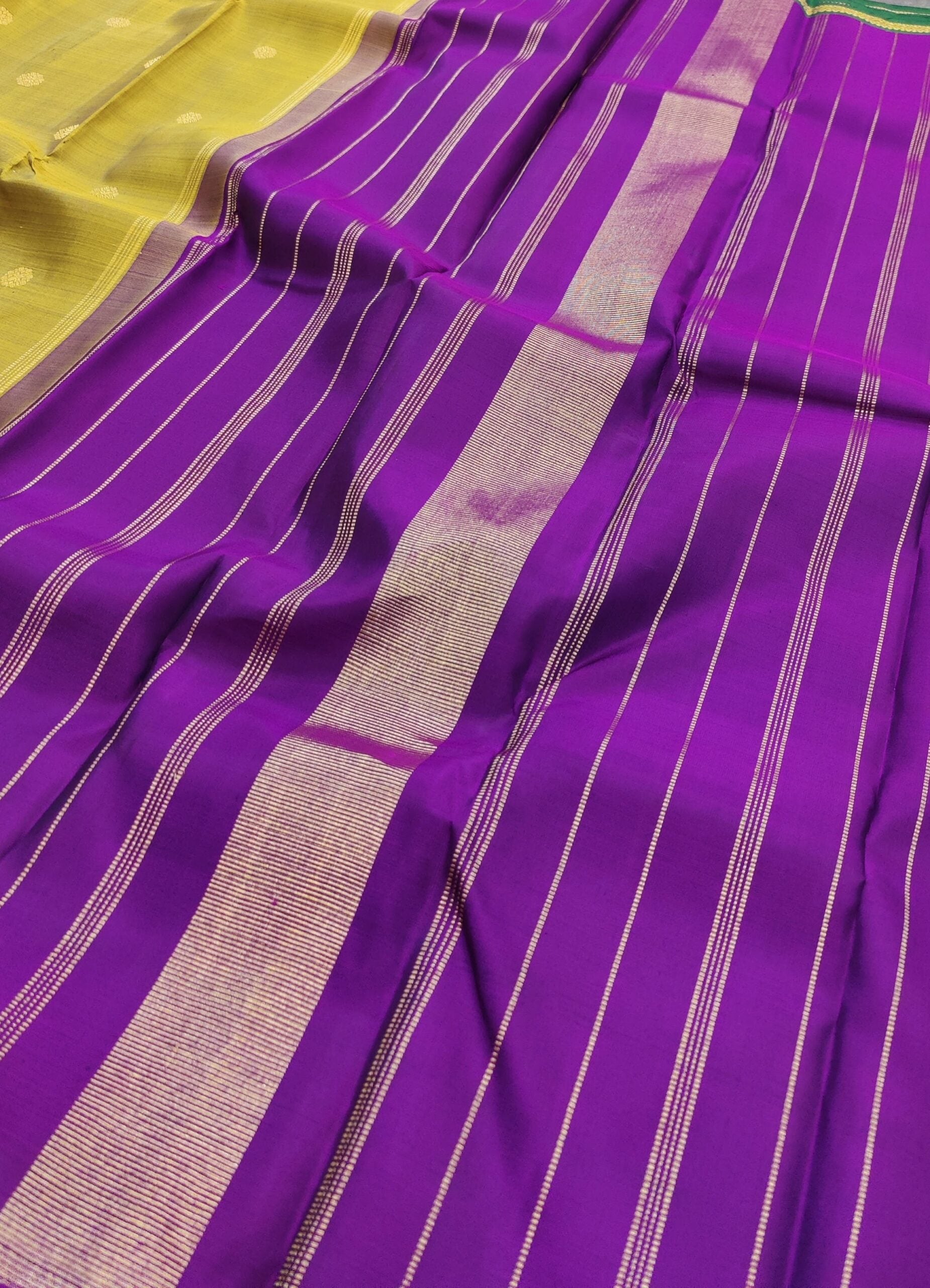 Fenugreek-green-and-violet-handwoven-Kanchipuram-silk-saree-with-flower-buttis-3.jpg