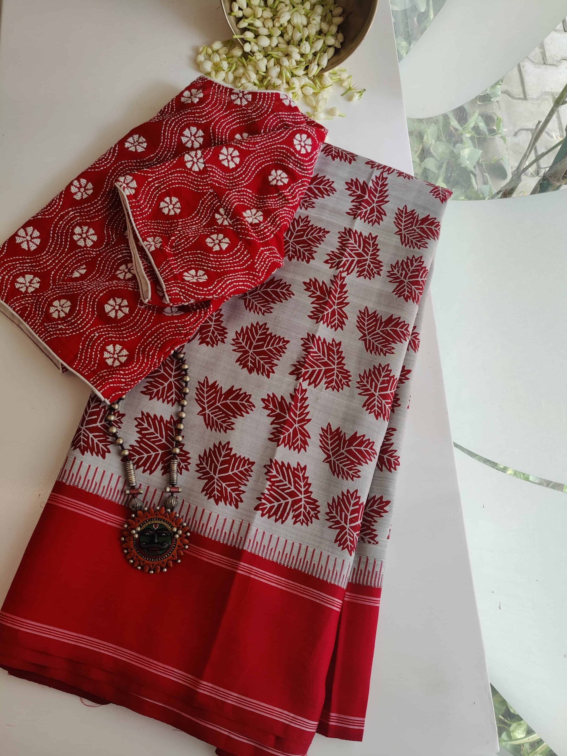 Grey-and-red-handblock-printed-Kanchipuram-silk-saree.jpg