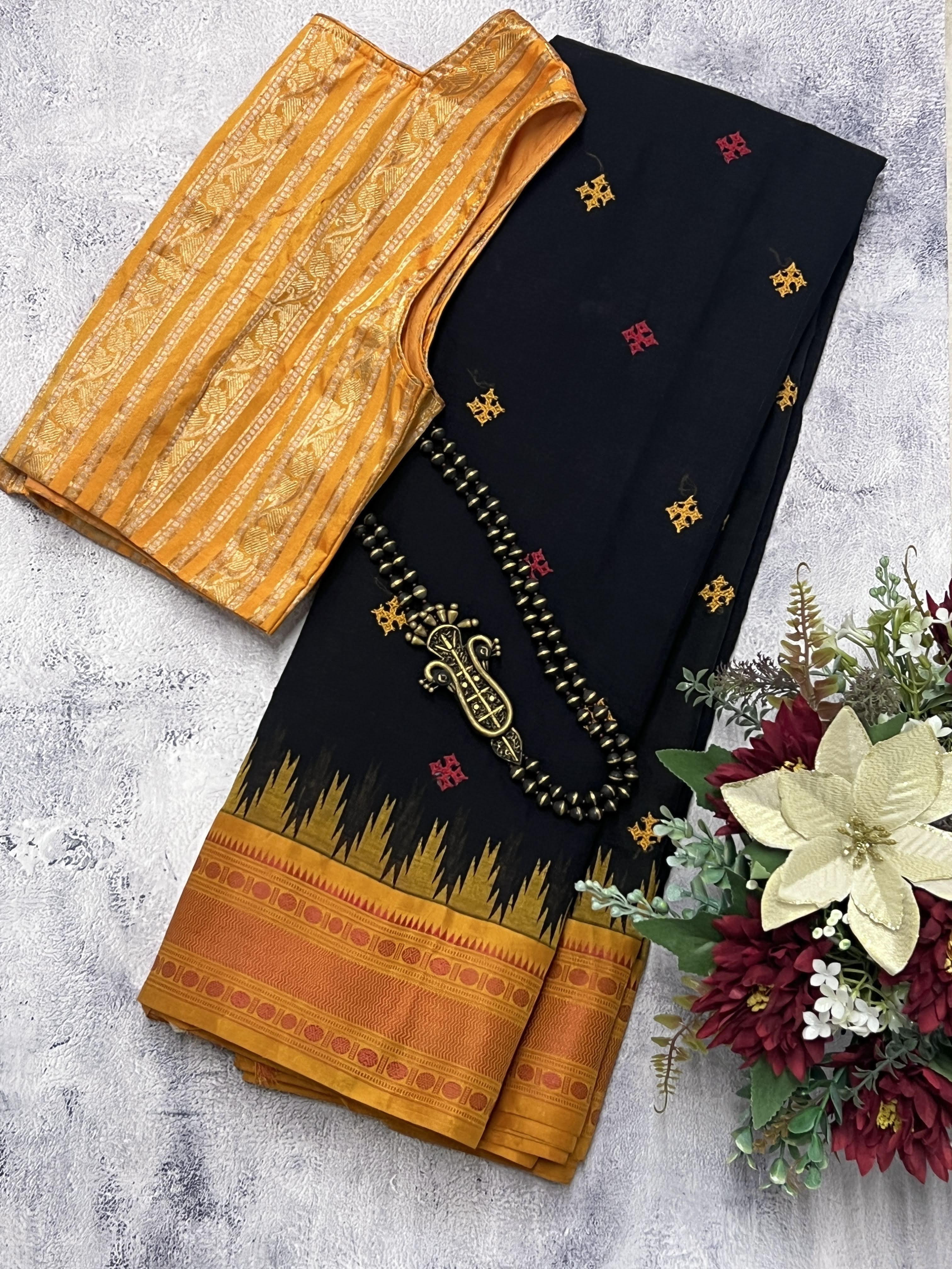 Kanchi cotton saree with silk border and Kutch embroidery