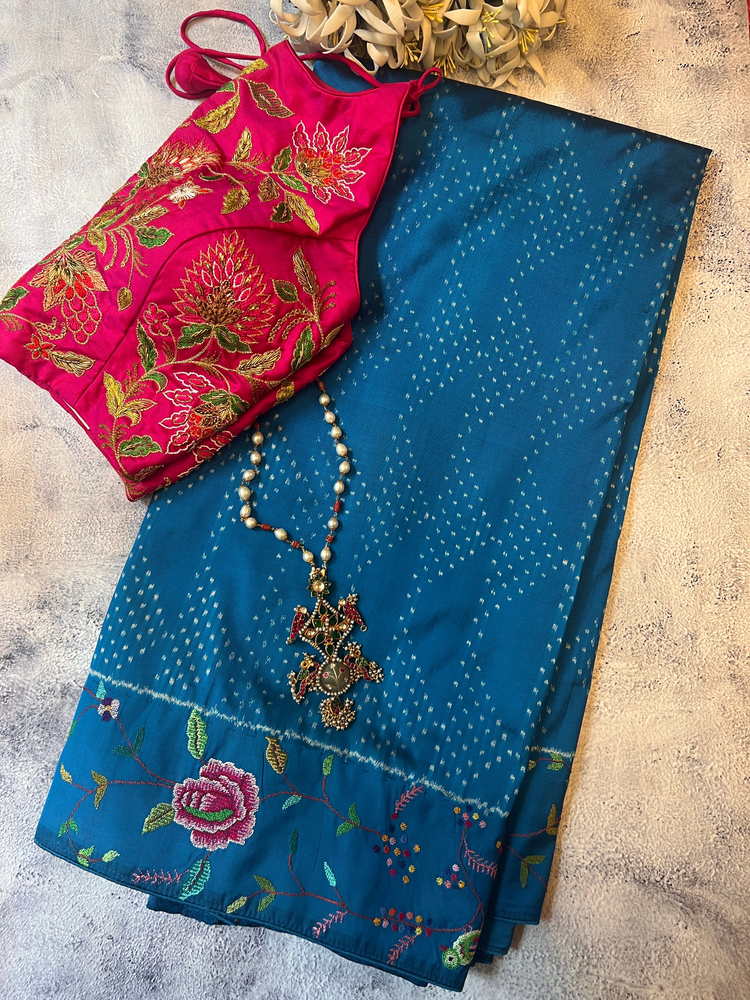 Silk ikat pettipoint embroidered saree