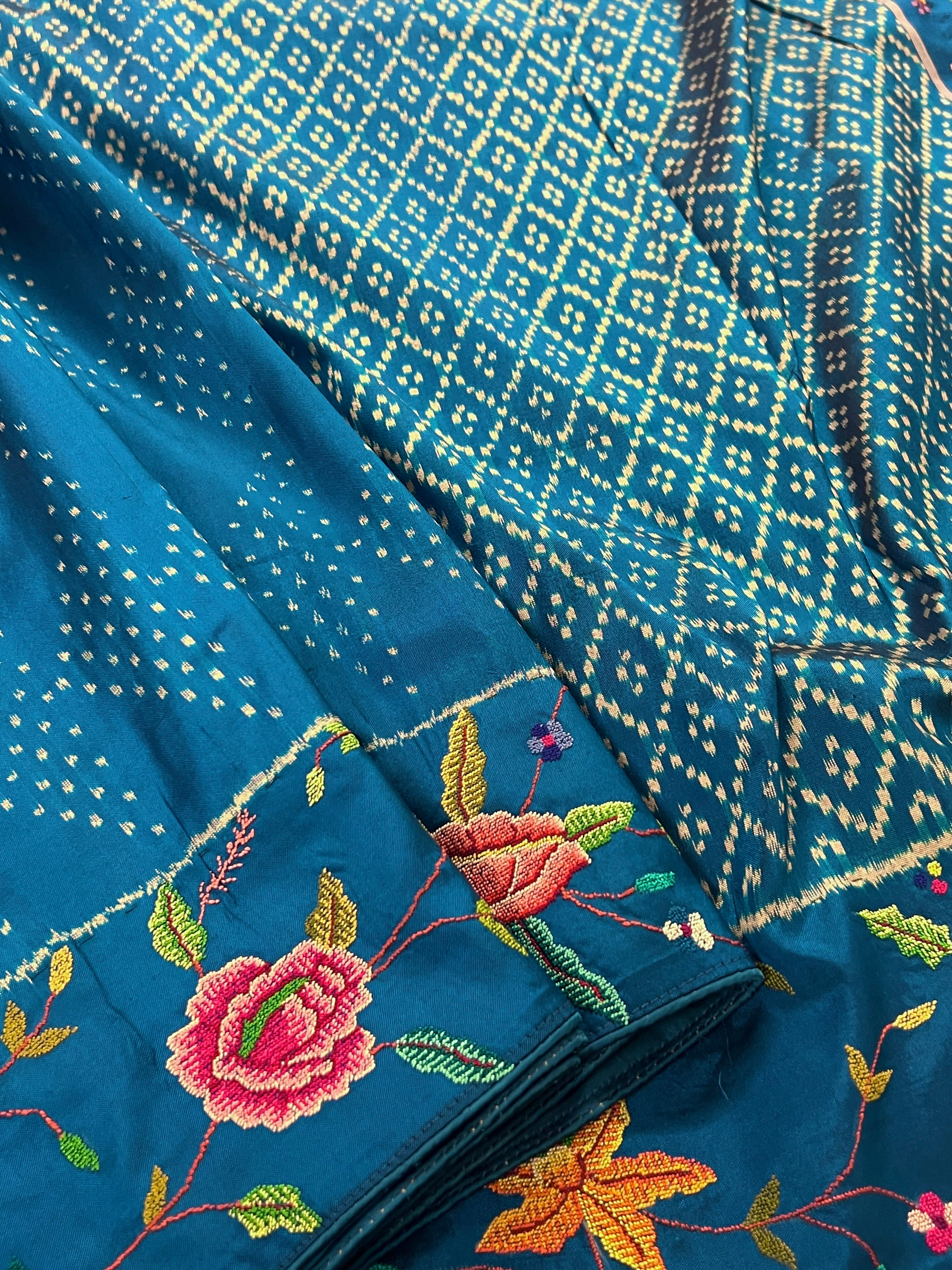 Silk ikat pettipoint embroidered saree